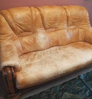 Faded Leather Sofa Before